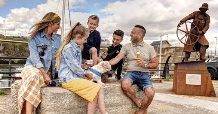 Family sat eating ice cream at Seaham Marina, County Durham